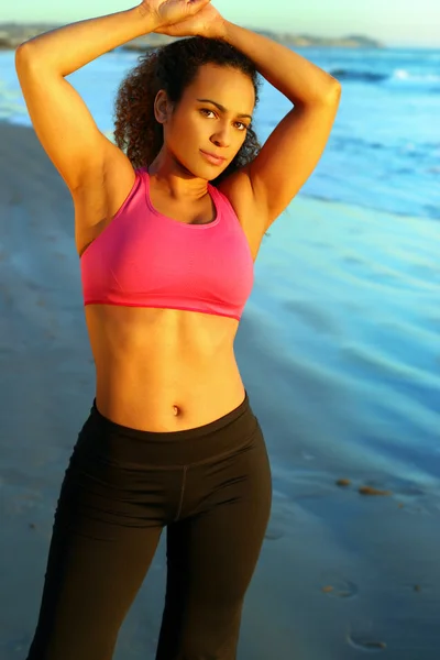 stock image Portrait of a pretty woman by the ocean