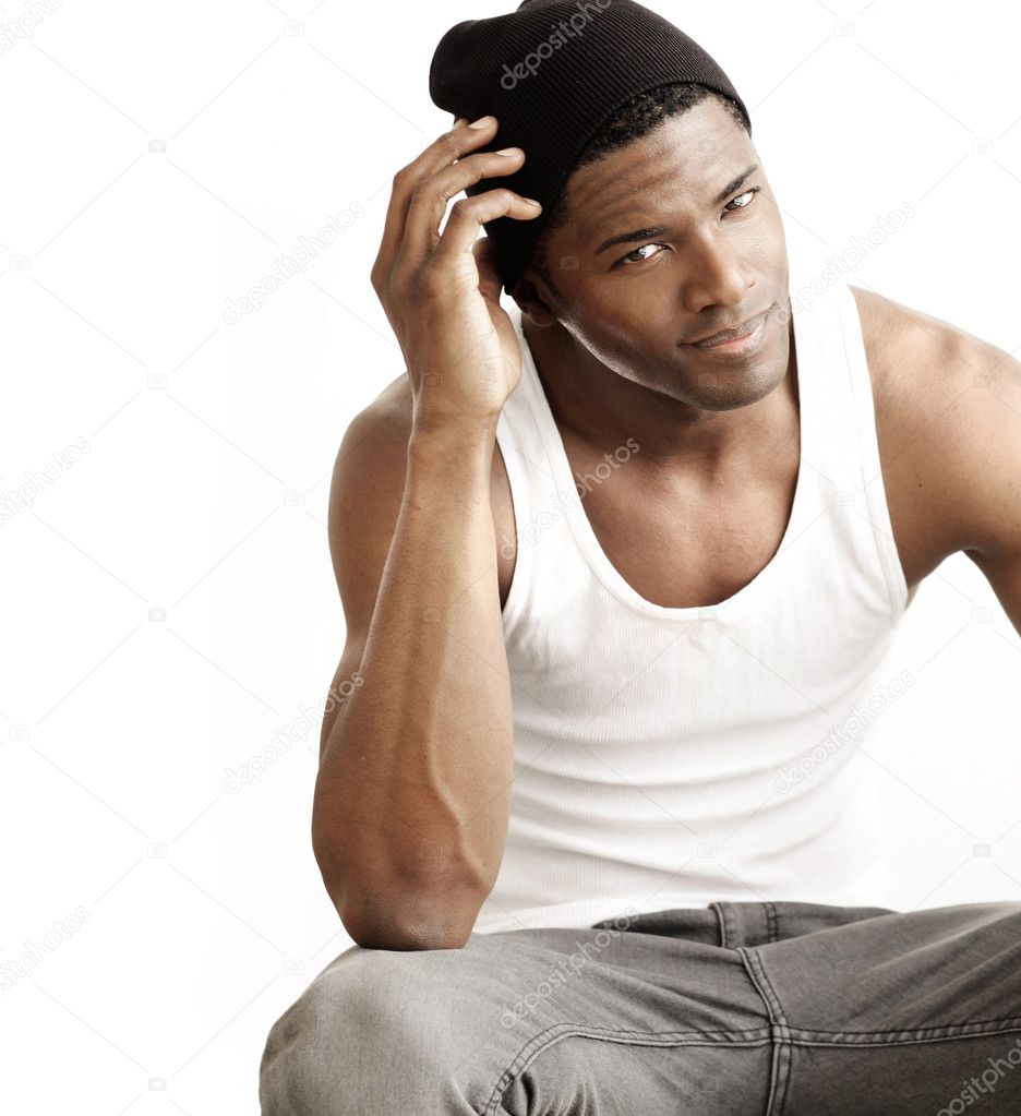 Sexy young man scratching head