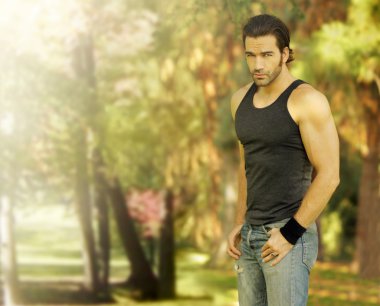 Male model in park setting clipart
