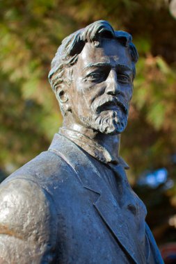 The monument of Anton Pavlovich Chekhov at the Yalta seafront clipart