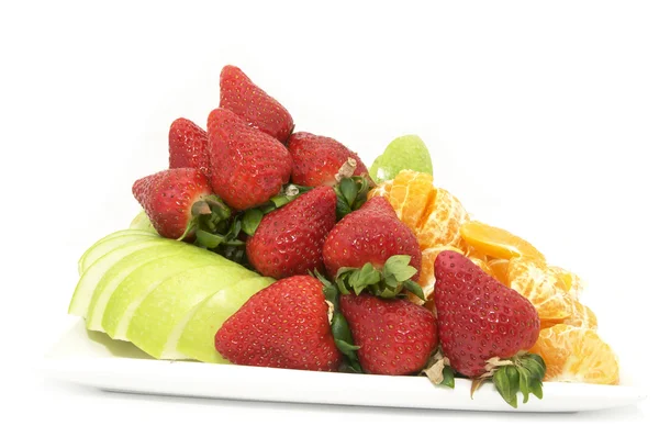 Ein Teller mit reifen Früchten — Stockfoto