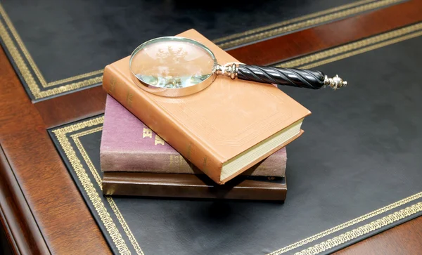 Book and Magnifying Glass — Stock Photo, Image