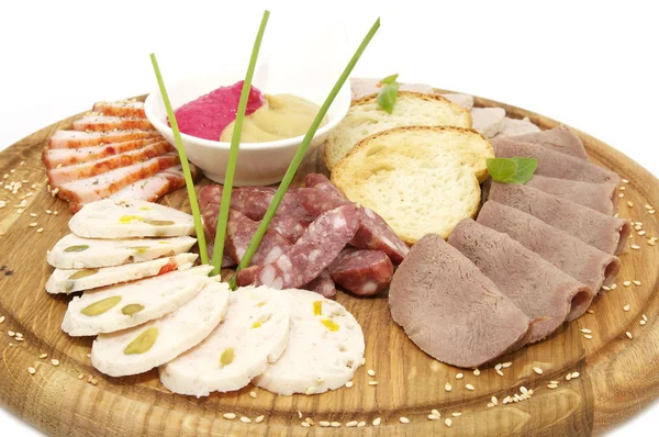 Wooden dish with bacon and sausage — Stock Photo, Image