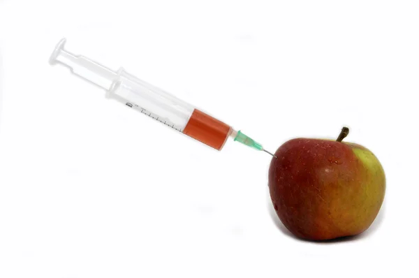 Sumo de maçã com seringa — Fotografia de Stock