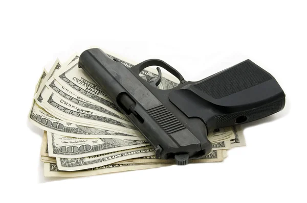 stock image Money and a gun