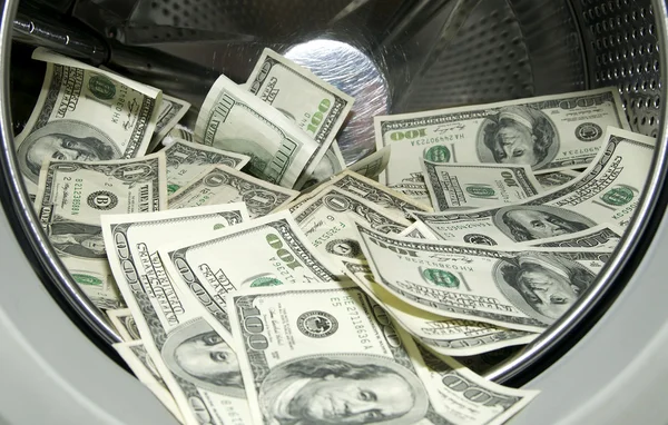Dollars in the washing machine — Stock Photo, Image