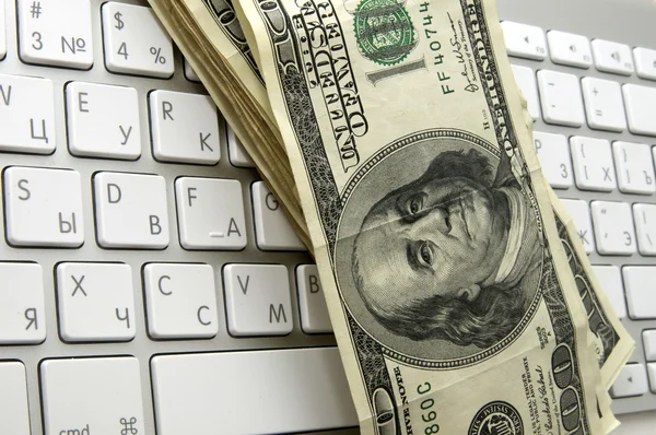 Dollars on the keyboard — Stock Photo, Image