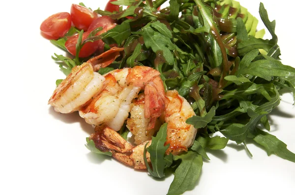 Shrimp with greens and tomatoes — Stock Photo, Image