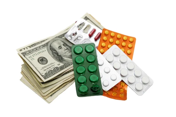 Dólares y pastillas — Foto de Stock