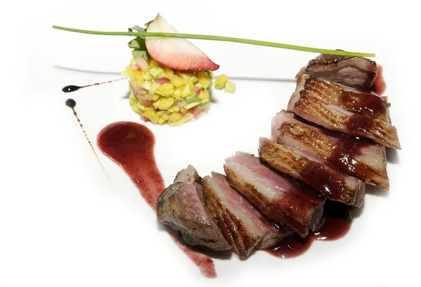 Grilled steak with garnish — Stock Photo, Image
