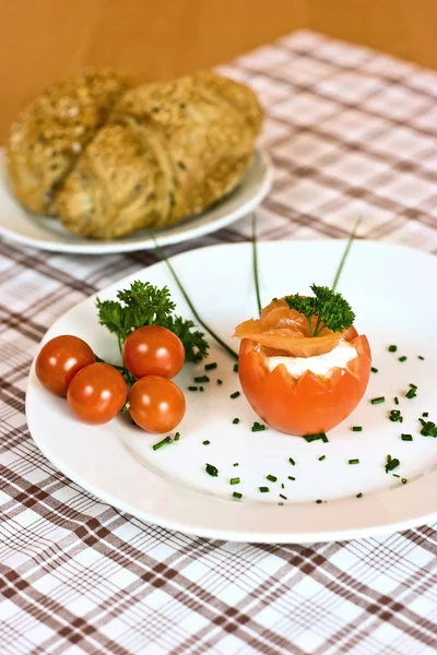 Red tomato with spread and bread — Stock Photo, Image