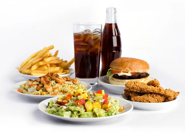 Fast food e cola su sfondo bianco — Foto Stock