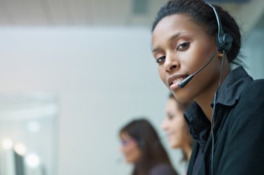 Women working in call center clipart