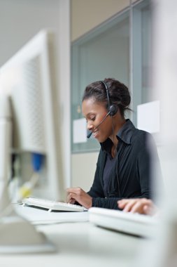 Women working in call center clipart