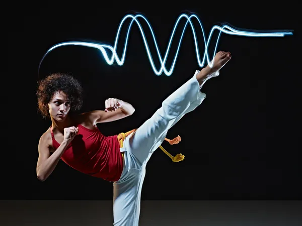 Spanyol nő capoeira harcművészet játék — Stock Fotó