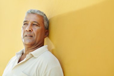 Portrait of sad mature hispanic man clipart