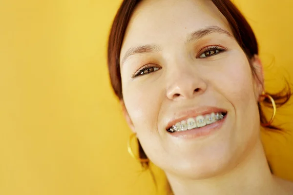 Young college student smiling at camera — Stock Photo, Image