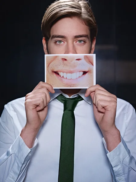 Businessman with big mouth smiling at camera — Stock Photo, Image