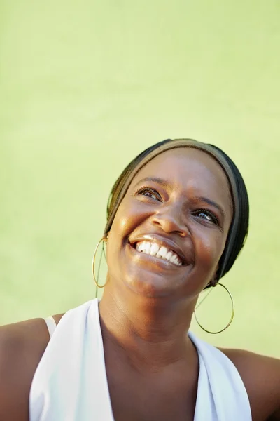 Black woman with white shirt smiling — Stock Photo, Image