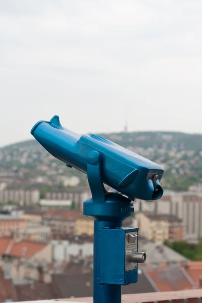 Bright blue tourist pay binoculars — Stok Foto