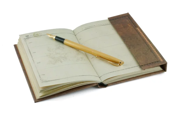 Een oude notebook en vulpen — Stockfoto