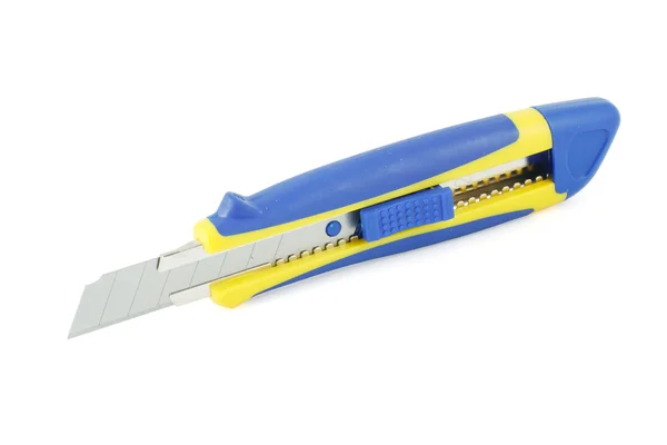 Yellow stationery knife — Stock Photo, Image