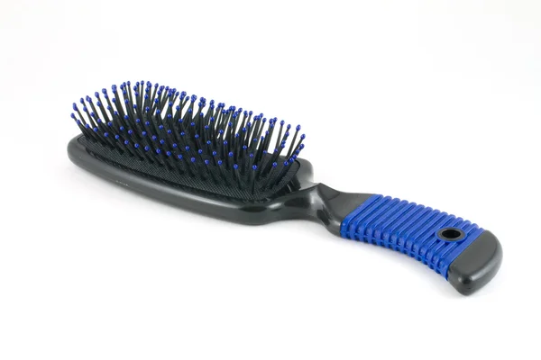 El cepillo para el cabello está aislado sobre un fondo blanco — Foto de Stock