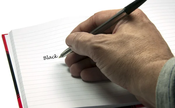 Hand skriva svart — Stockfoto