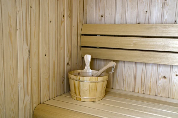 Wooden bucket in sauna