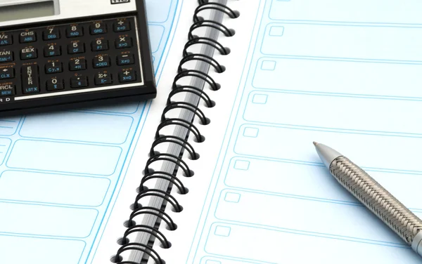 Agenda pen and calculator — Stock Photo, Image