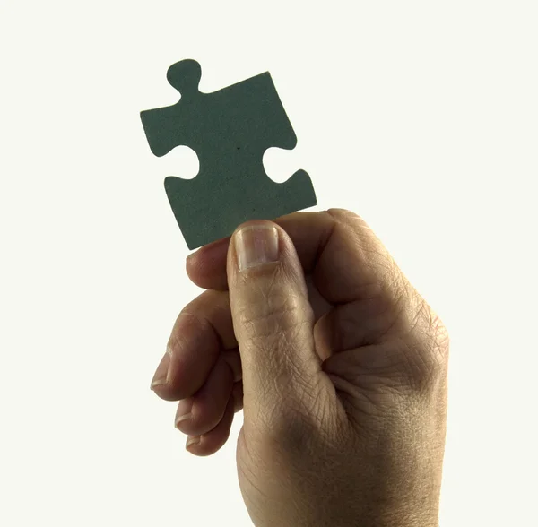 Homme et pièce de puzzle — Photo