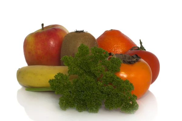 Apple banana parsley orange and other fruit — Stock Photo, Image