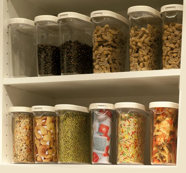 Cupboard with food stock — Stock Photo, Image
