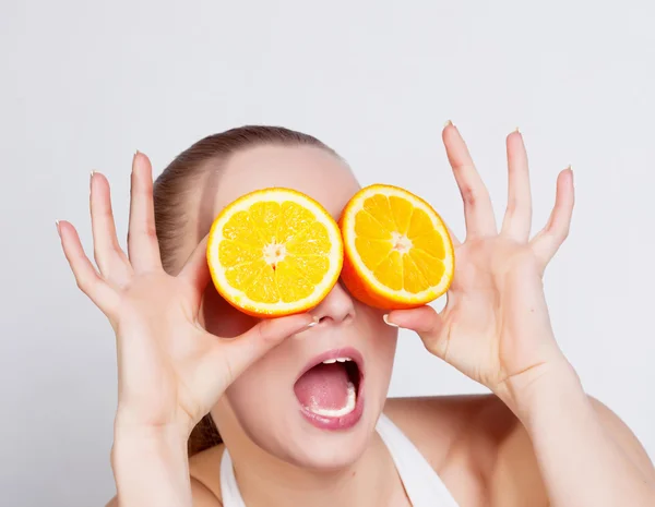 Girl with fresh orange — Stock Photo, Image