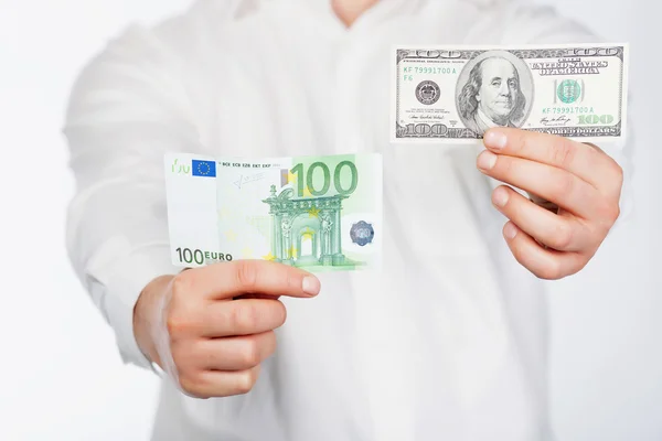 Homme avec dollar et euro — Photo