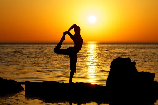 Stock image Yoga on sunset