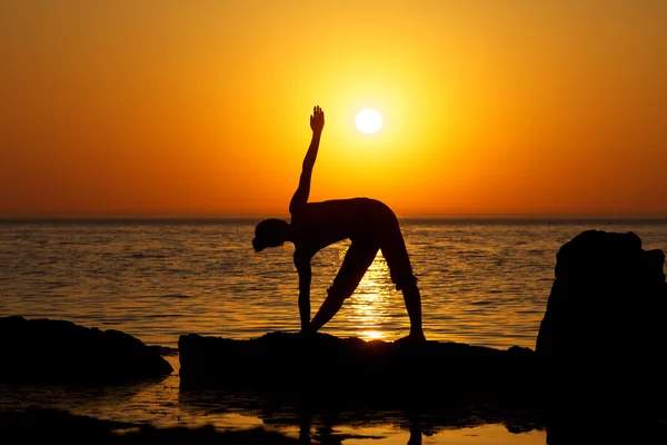 Yoga on sunset — Stock Photo, Image