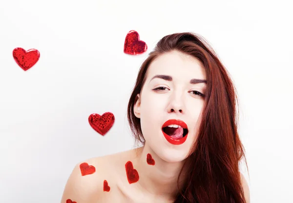 Brunette meisje met rode harten — Stockfoto