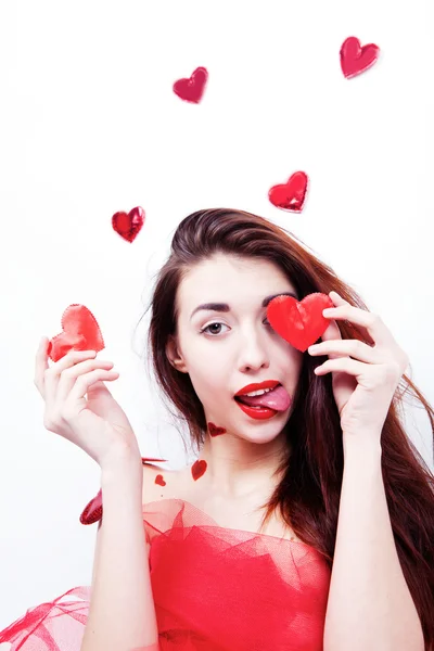 Brunette fille avec des cœurs rouges — Photo