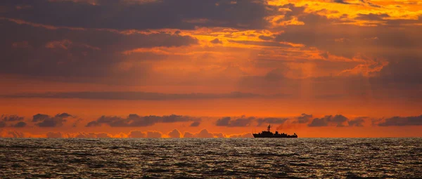 Navy ship on sunset — Stock Photo, Image