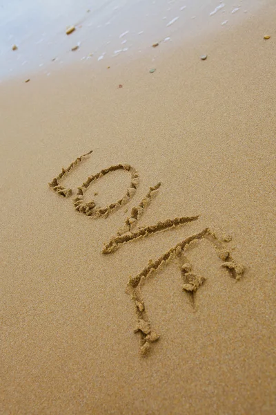 Liefde inscriptie op het zand — Stockfoto