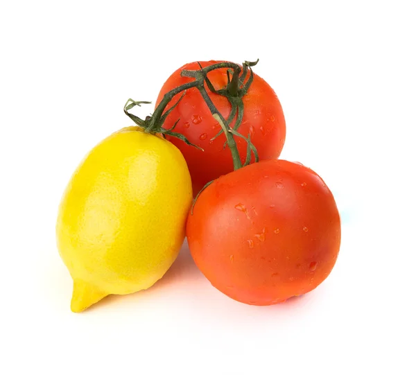 Pomidor i cytryny — Zdjęcie stockowe