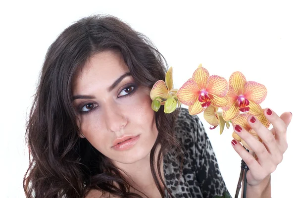 Young girl with orchid — Stock Photo, Image