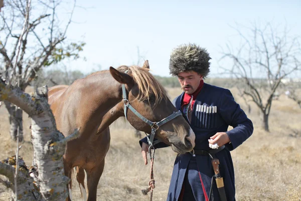 stock image Ukrainian Cossack with horse