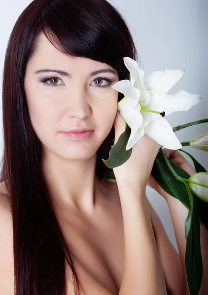 Girl with lily — Stock Photo, Image