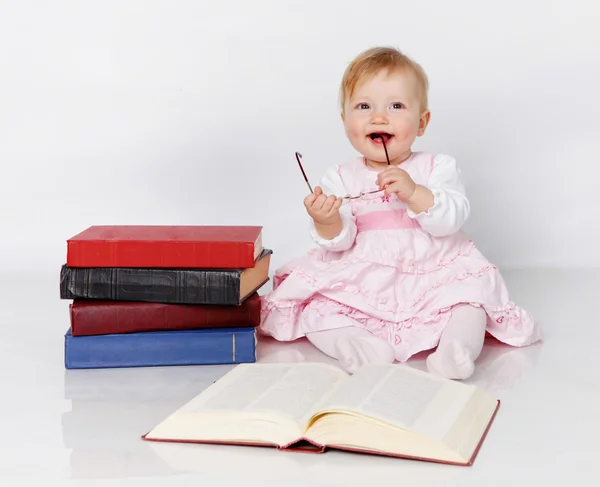 Baby with books — Stock Photo, Image