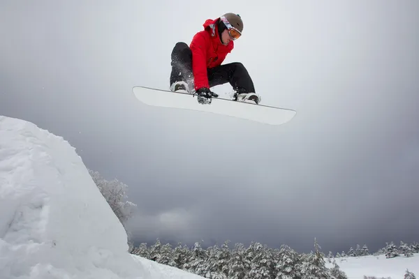 Snowboarding jump — Stock Photo, Image
