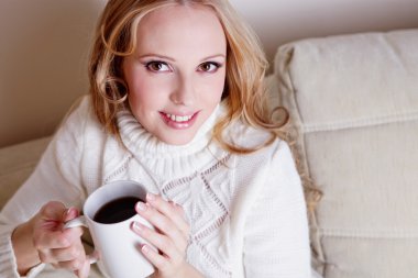 Blond girl with coffee cup clipart