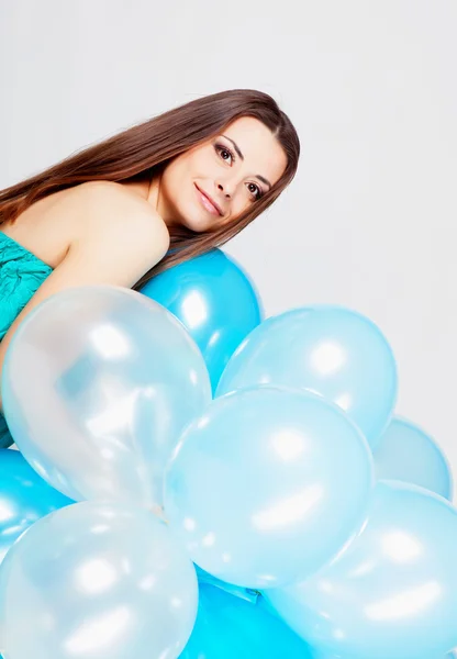 Girl with balloons in studio — Stock Photo, Image