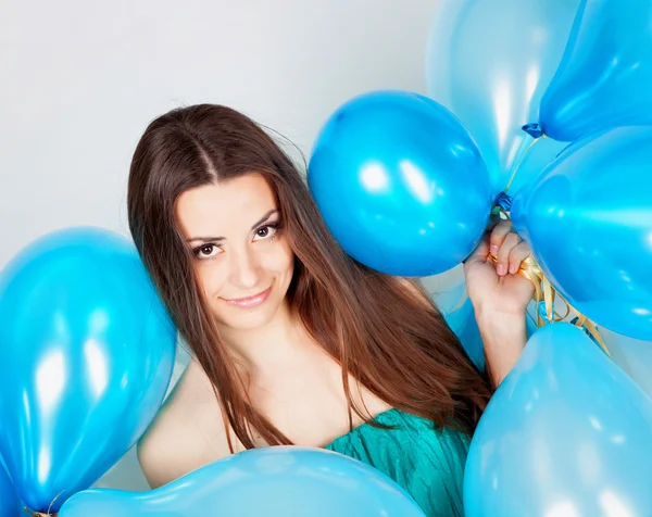 Meisje met ballonnen in studio — Stockfoto